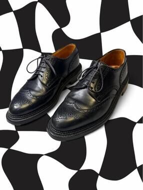 J.M. WESTON Black leather brogue oxfords with brogue detailing